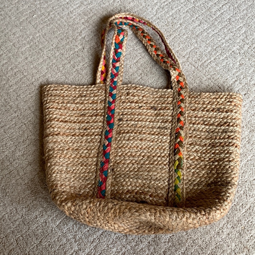 Never used, jute bag. Bucket bag with two handles would make a great beach bag.